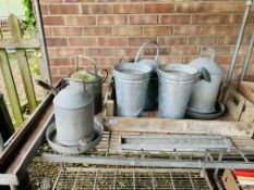 A COLLECTION OF VARIOUS GALVANISED WATERING CANS AND POULTRY FEEDERS ETC.