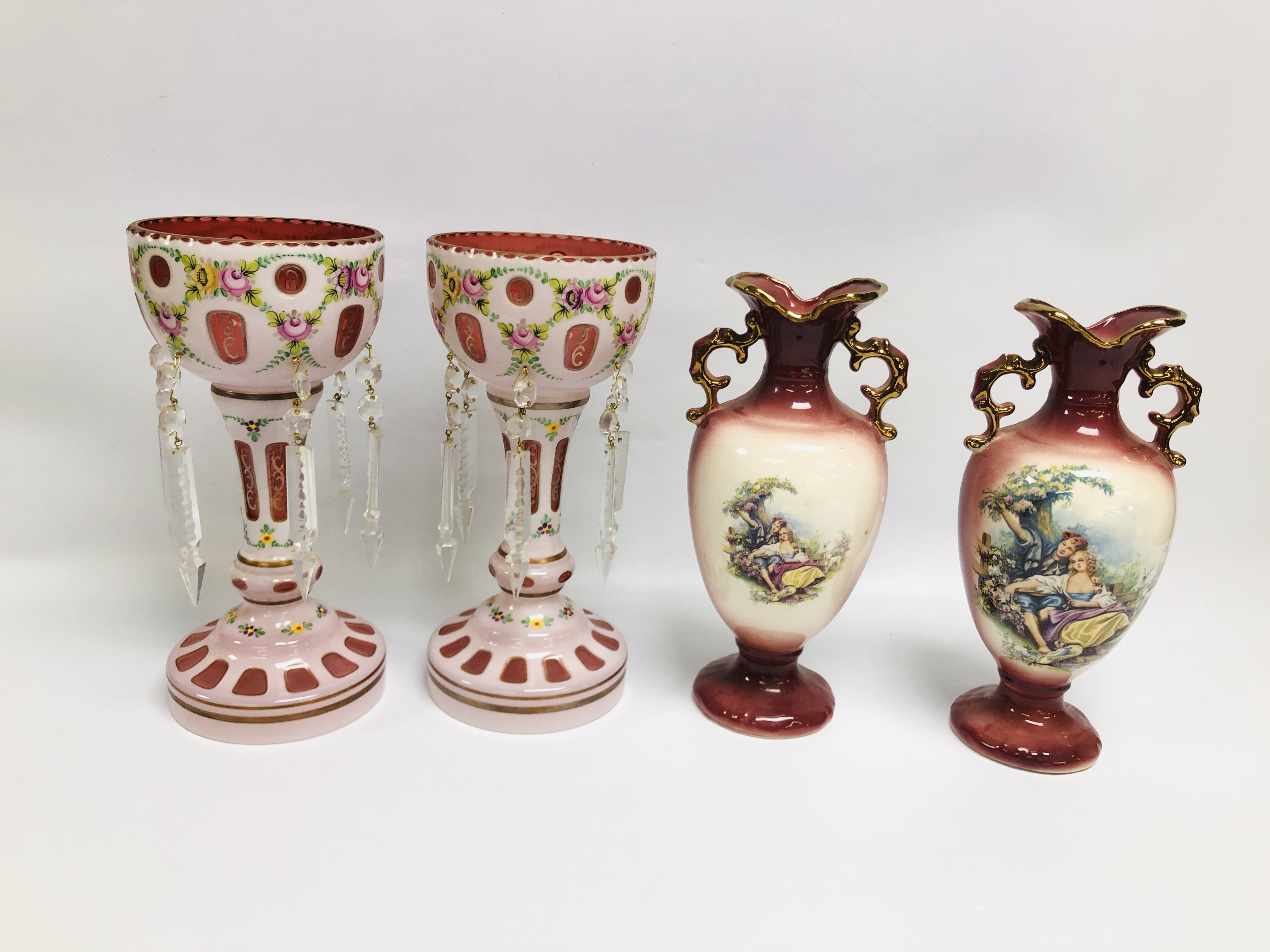 A PAIR OF CLASSICAL PINK GRASS LUSTRES WITH DROP AND PAIR OF REPRODUCTION GILT DECORATED VASES