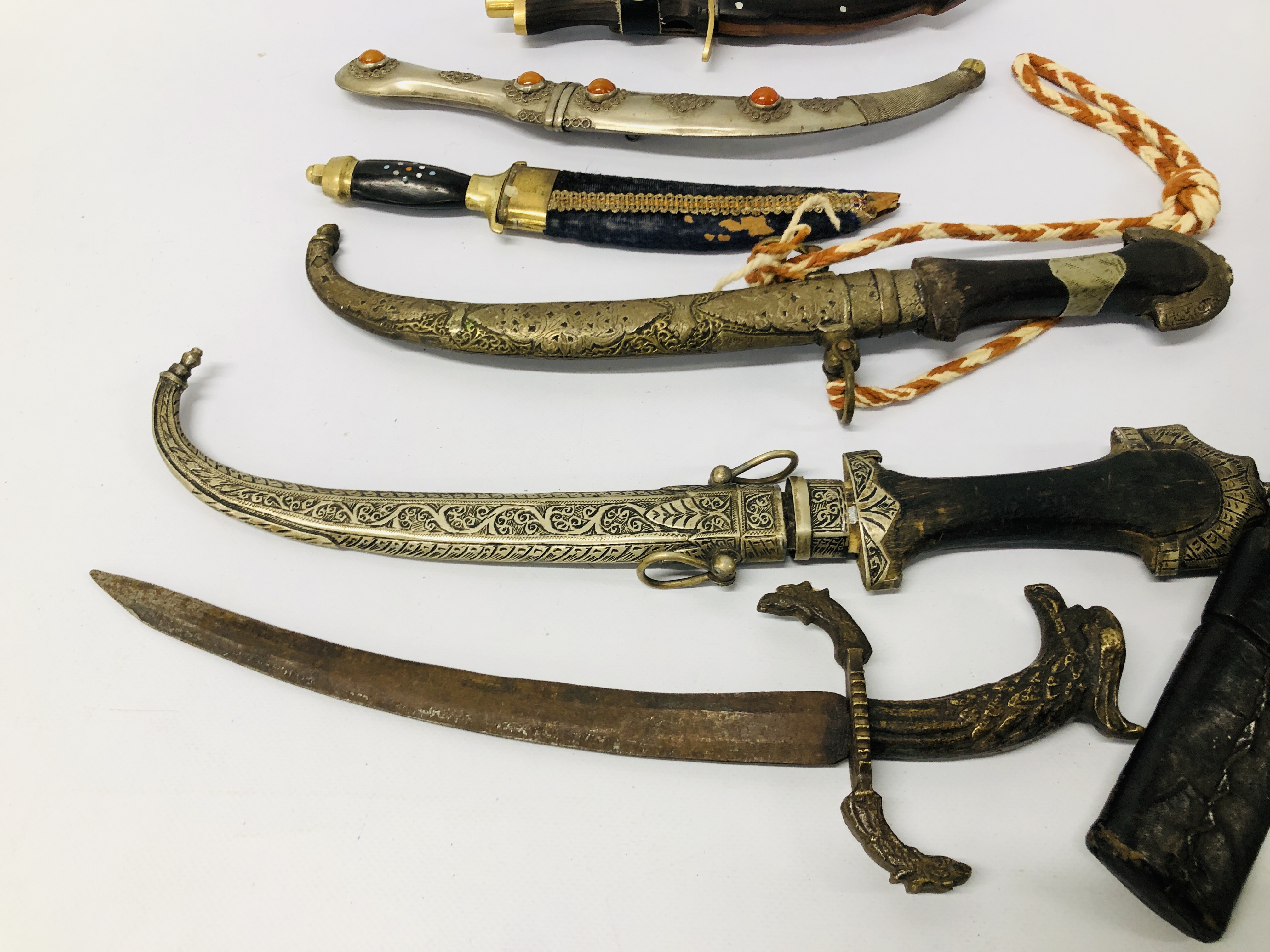 A COLLECTION OF EIGHT VARIOUS DECORATIVE MAINLY EASTERN DAGGERS - Image 3 of 9