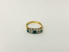 AN 18CT GOLD DIAMOND AND EMERALD SET RING