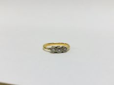 YELLOW METAL 3 STONE DIAMOND RING