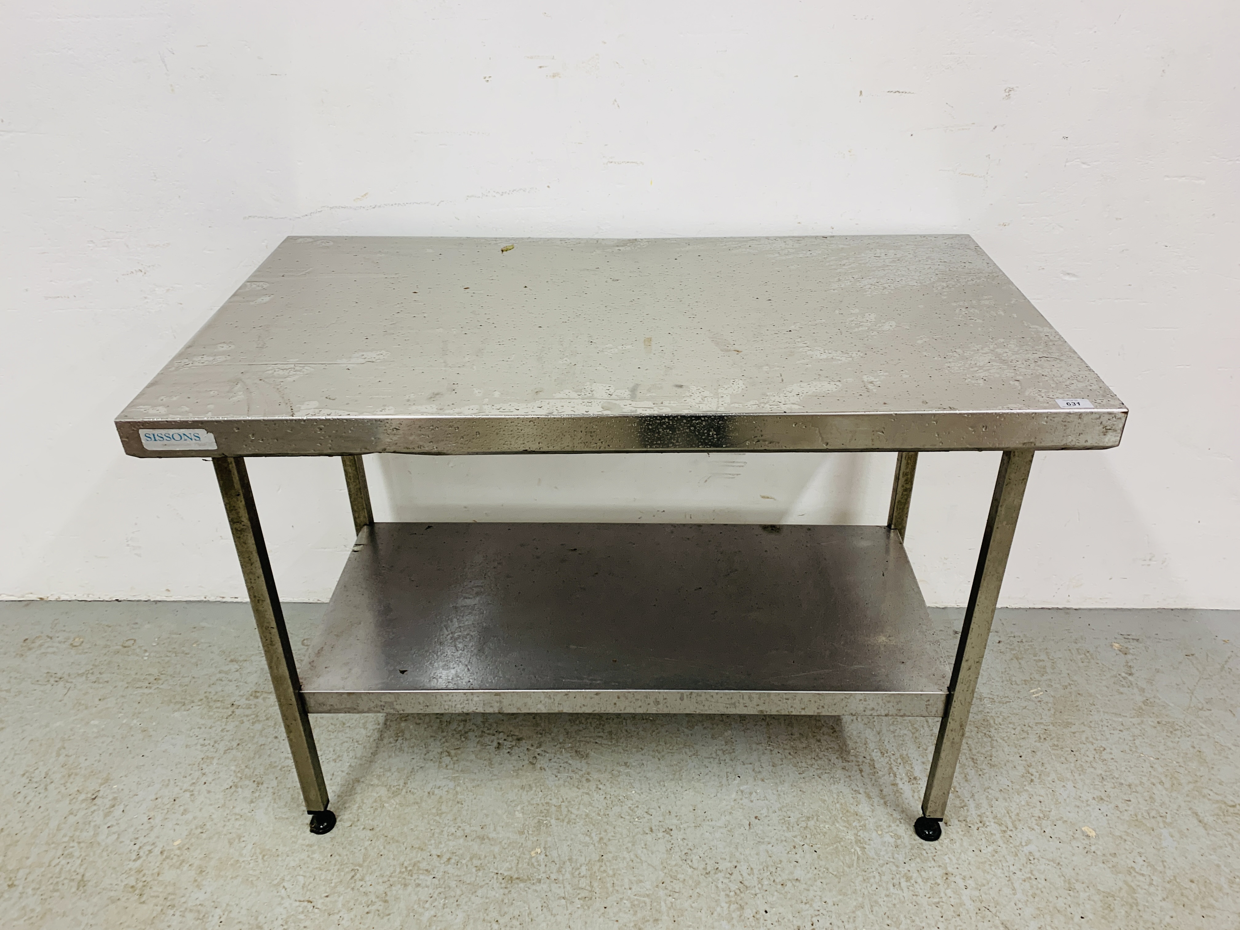 A SISSONS STAINLESS STEEEL 2 TIER PREPARATION TABLE W - 120CM X D - 65 CM.