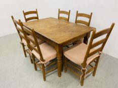 A COUNTRY WAXED PINE EXTENDING KITCHEN TABLE - L 140CM.