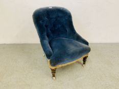 A VICTORIAN BLUE VELVET UPHOLSTERED NURSING CHAIR