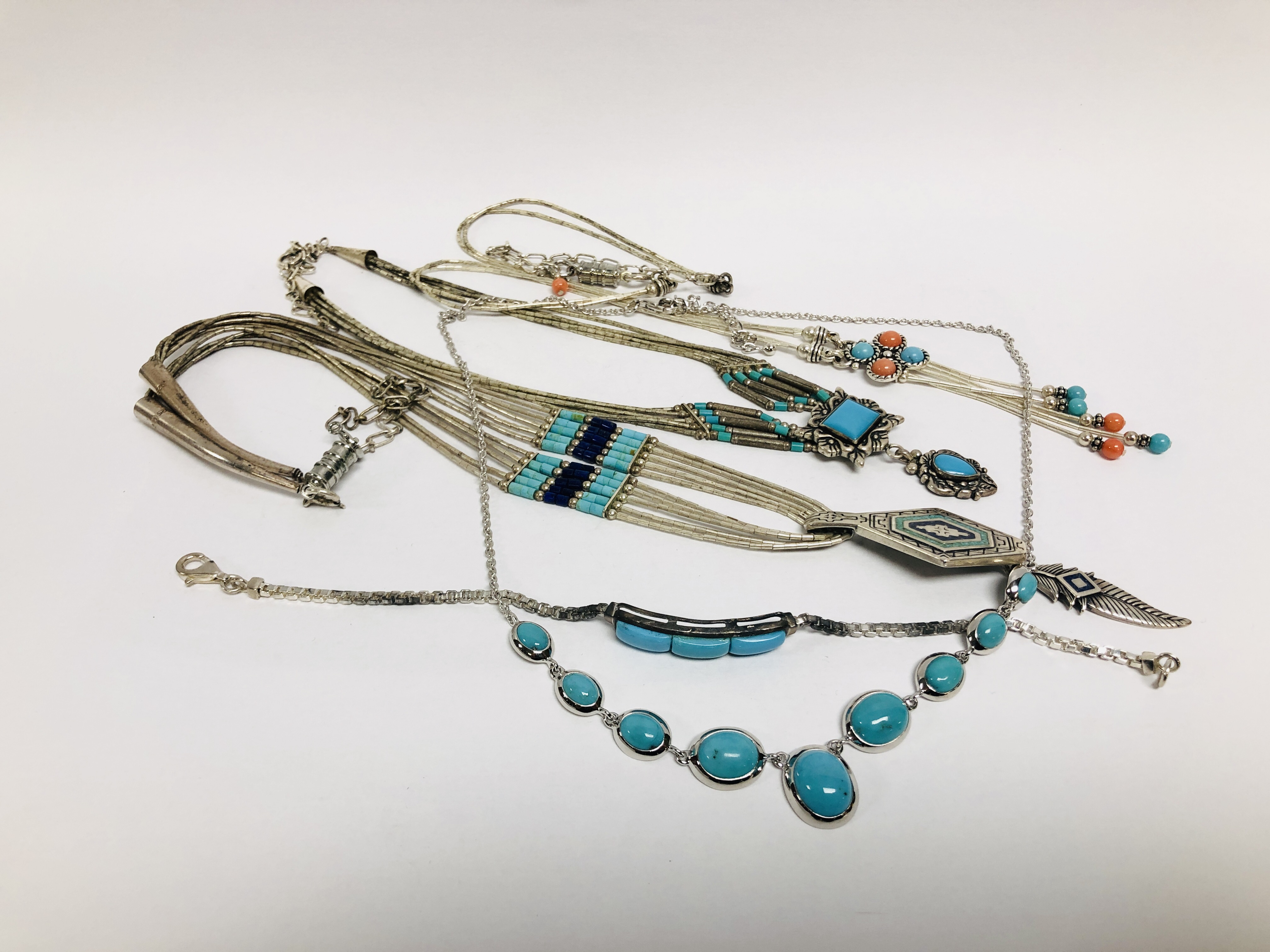 3 X SILVER SOUTH AMERICAN MULTI STRAND NECKLACES WITH BEADED AND ENAMELLED DETAIL ALONG WITH A