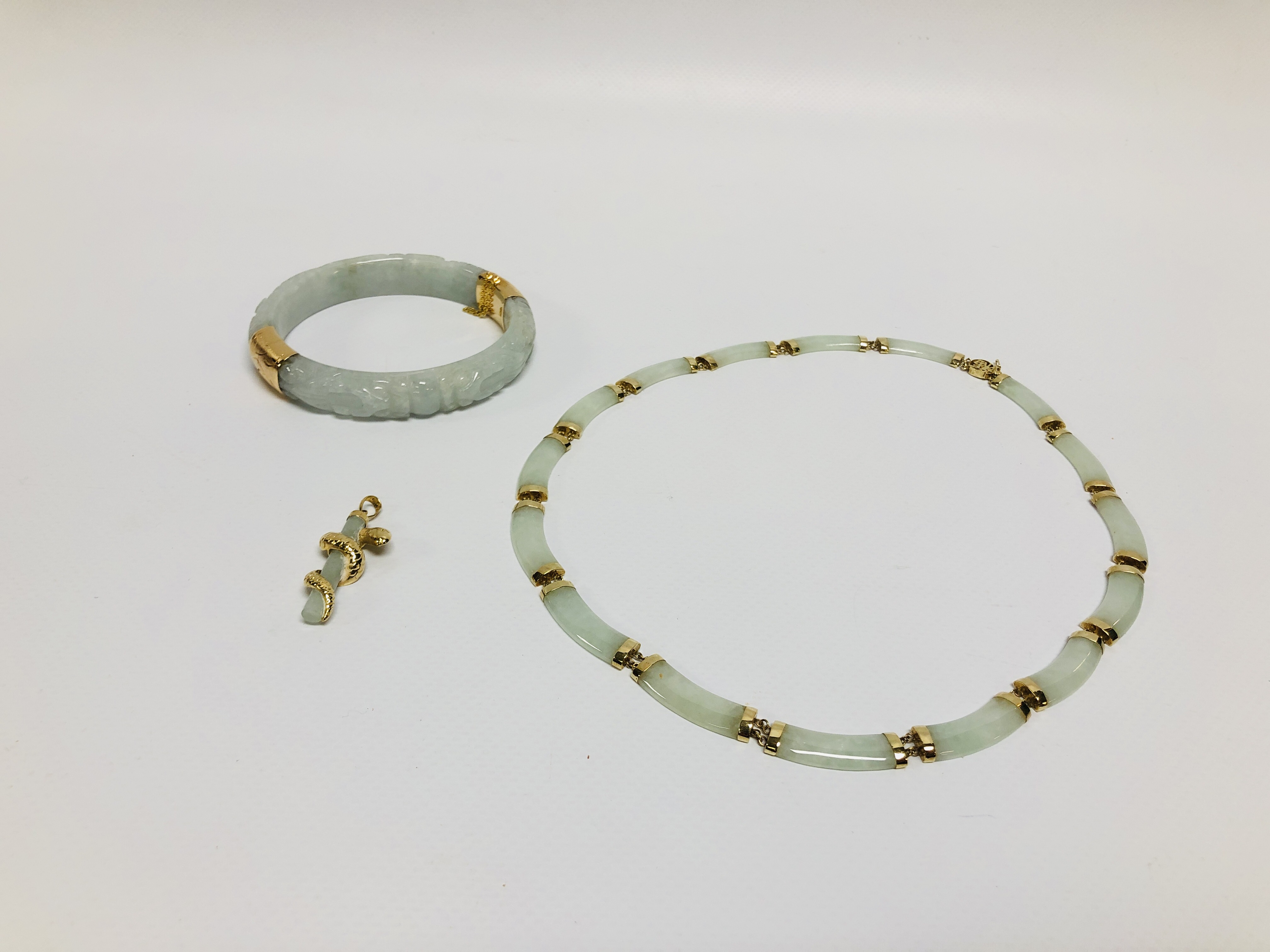 JADE NECKLACE THE LINKS AND CLASP 14CT GOLD ALONG WITH A JADE HINGED BANGLE THE CLASP AND HINGE