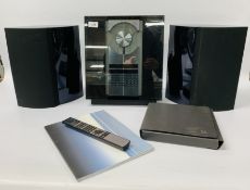 A BANG & OLUFSEN BEOCENTER 2300 COMPLETE WITH SPEAKERS, WALL BRACKETS, REMOTE SPEAKER CABLES,