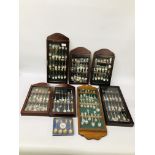 AN EXTENSIVE COLLECTION OF 130 COLLECTORS SOUVENIR SPOONS IN DISPLAY CASES AND LOOSE.