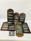 AN EXTENSIVE COLLECTION OF 130 COLLECTORS SOUVENIR SPOONS IN DISPLAY CASES AND LOOSE.