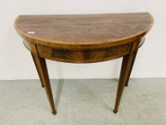 A GEORGE III MAHOGANY D SHAPED CARD TABLE ON SQUARE TAPERED LEGS - WIDTH 95CM.