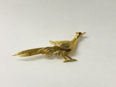 A 9CT GOLD PHEASANT BROOCH THE EYE SET WITH A RUBY OVERALL LENGTH 60MM