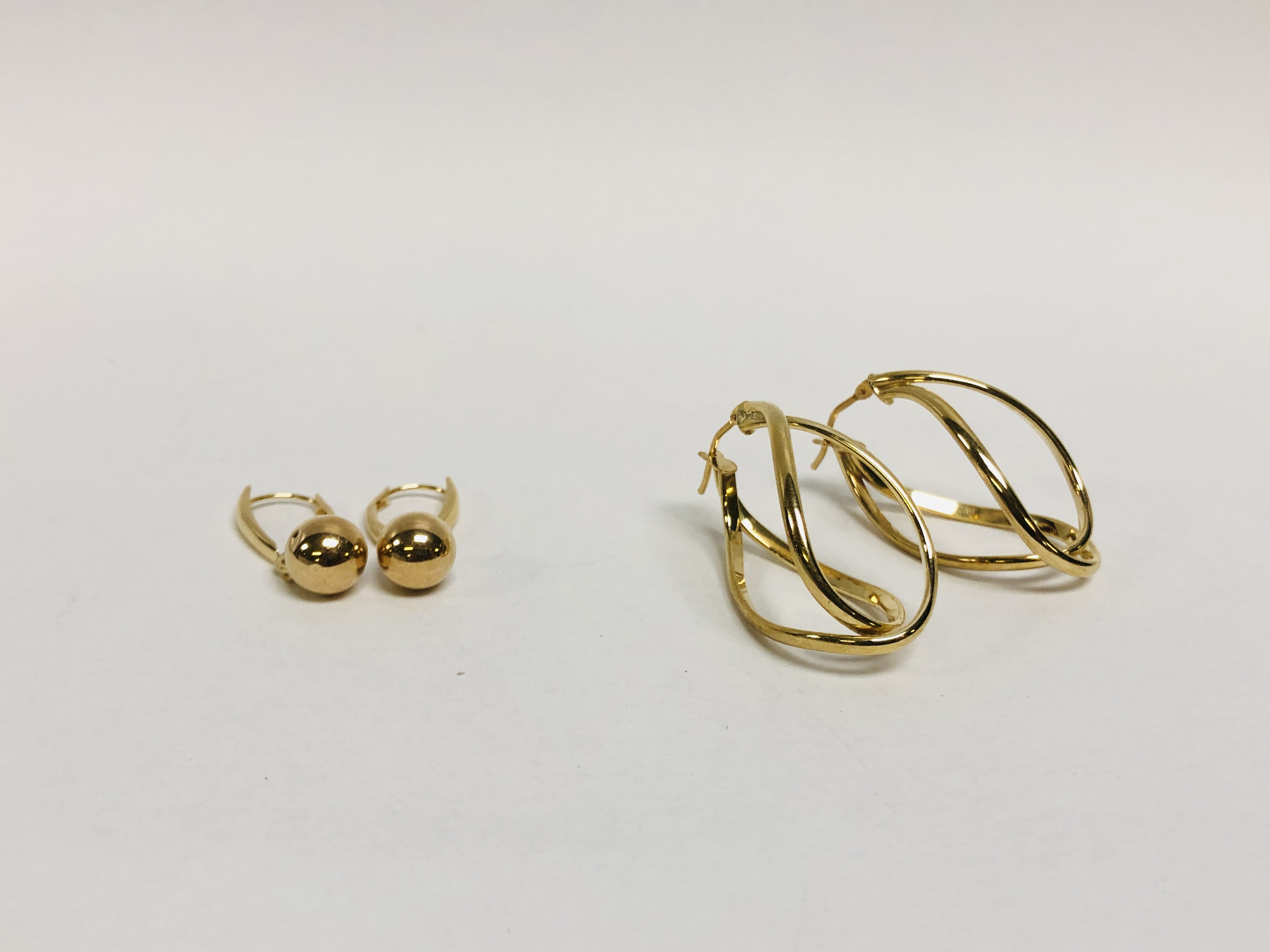 PAIR OF 9CT GOLD DESIGNER EARRINGS + PAIR OF BALL DESIGN EARRINGS MARKED 10K