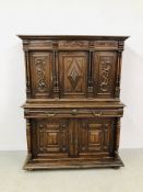 A FRENCH OAK DRESSER, THE UPPER SECTION HAVING THREE PANELLED DOORS,