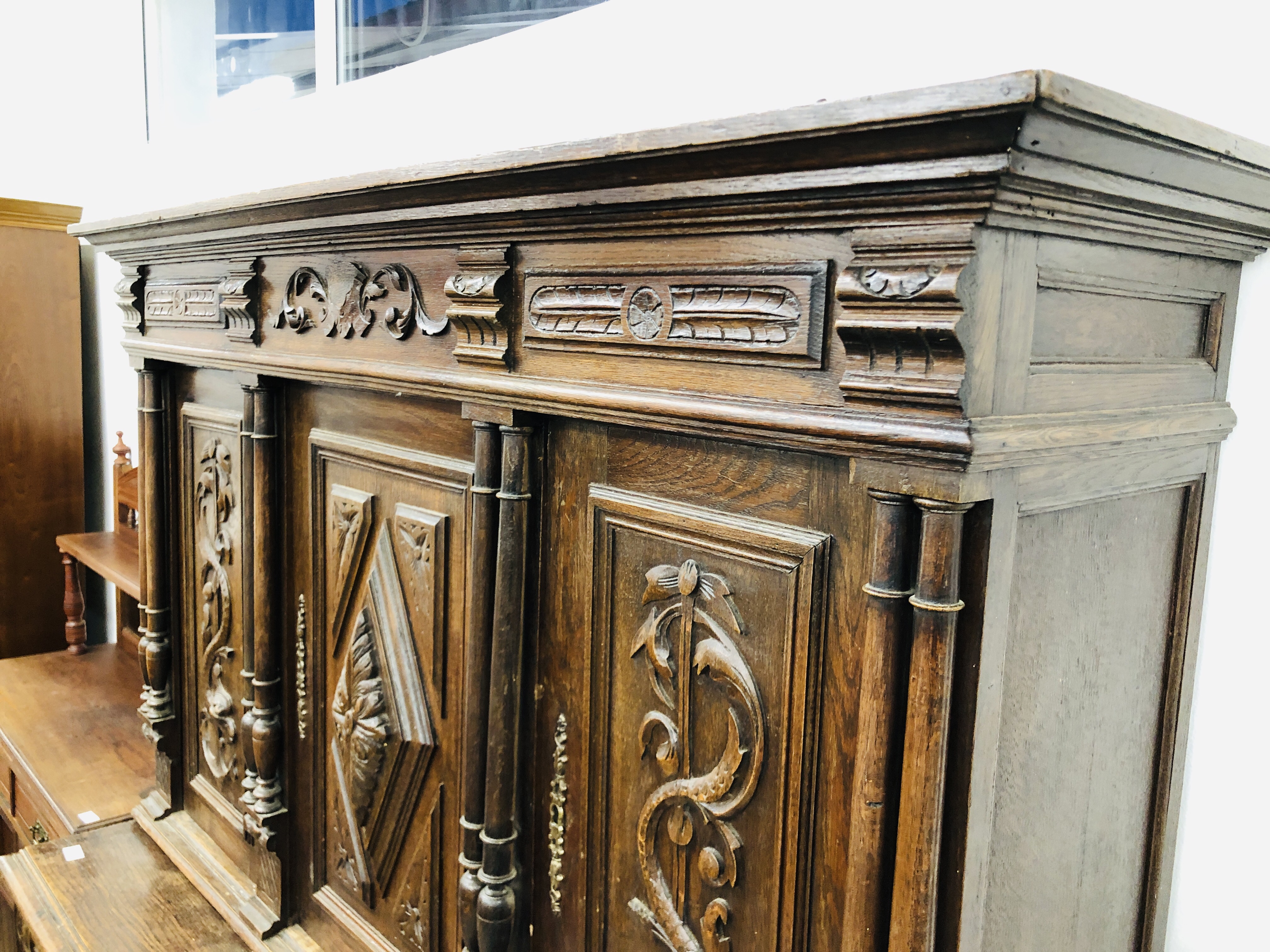 A FRENCH OAK DRESSER, THE UPPER SECTION HAVING THREE PANELLED DOORS, - Image 8 of 30