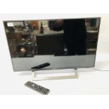 A SONY BRAVIA 32 INCH SMART TELEVISION WITH REMOTE - SOLD AS SEEN