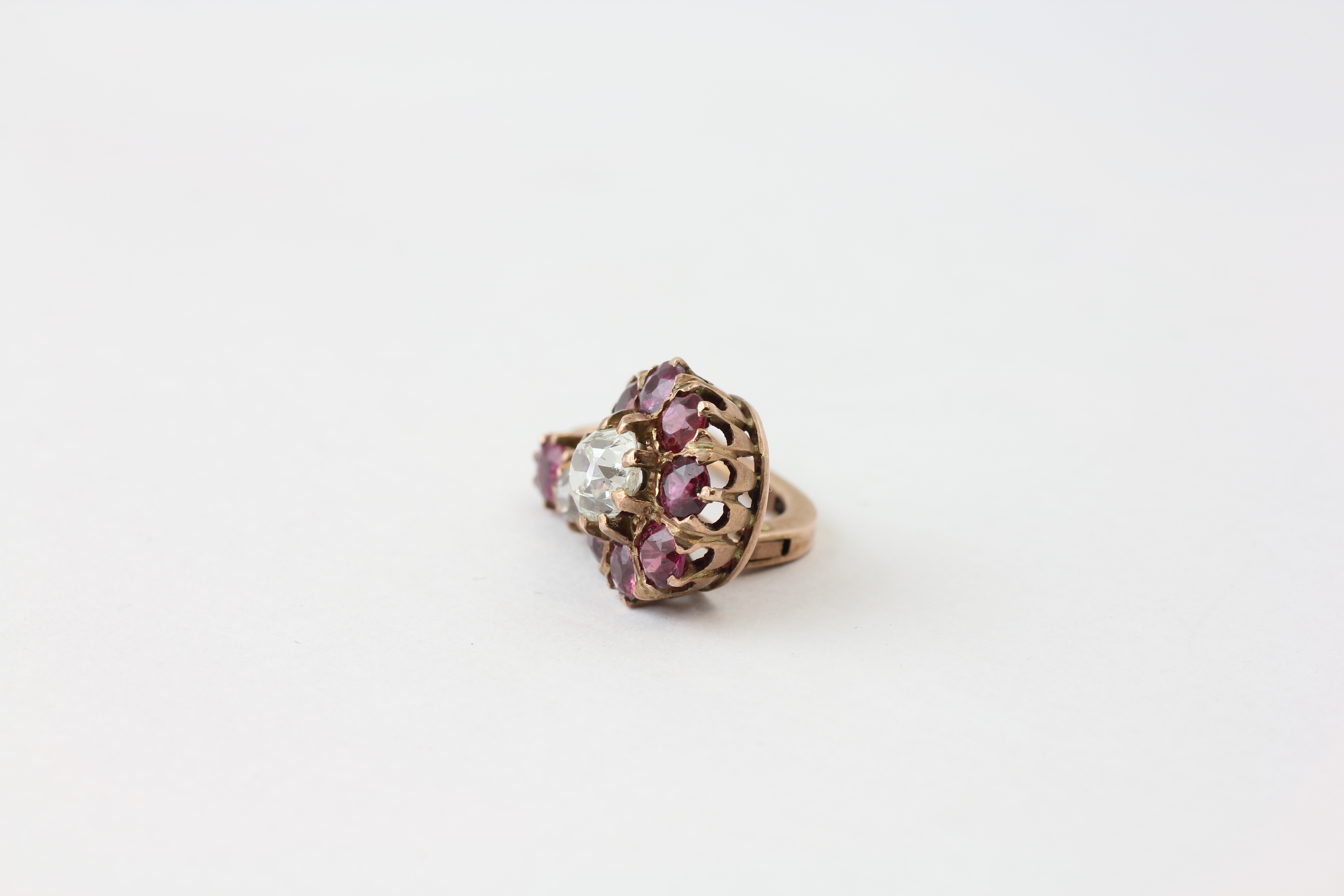 A PAIR OF DIAMOND EARRINGS, THE CENTRAL OLD CUT STONE SURROUNDED BY SMALL MAUVE STONES, - Image 4 of 6