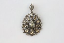 A SINGLE DIAMOND PENDANT WITH PEAR SHAPED STONES, SET WITH 36 OLD CUT DIAMONDS,