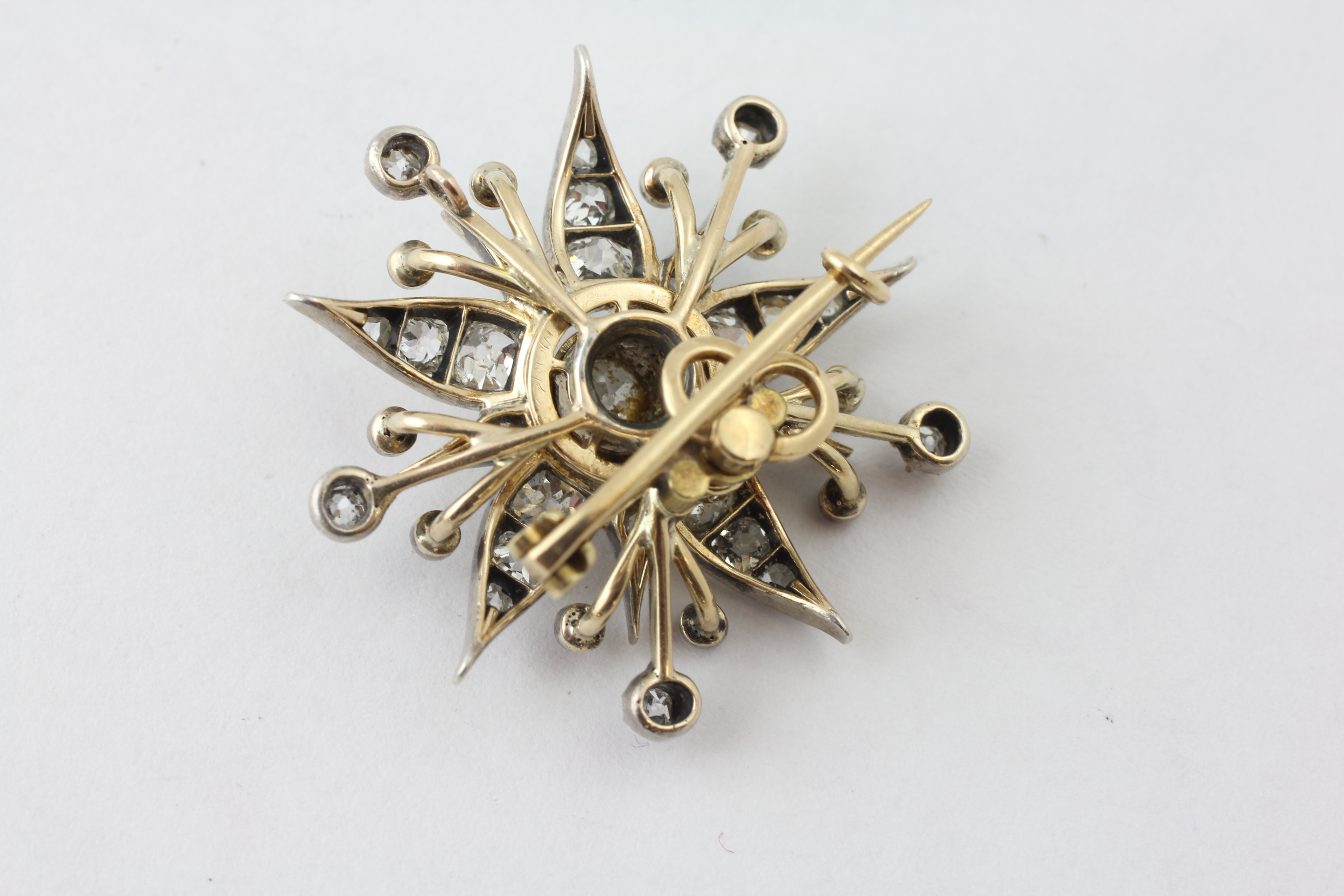 A DIAMOND BROOCH OF FLOWERHEAD FORM WITH ADJUSTMENT FOR A PENDANT, SET WITH 42 OLD CUT DIAMONDS, - Image 6 of 6