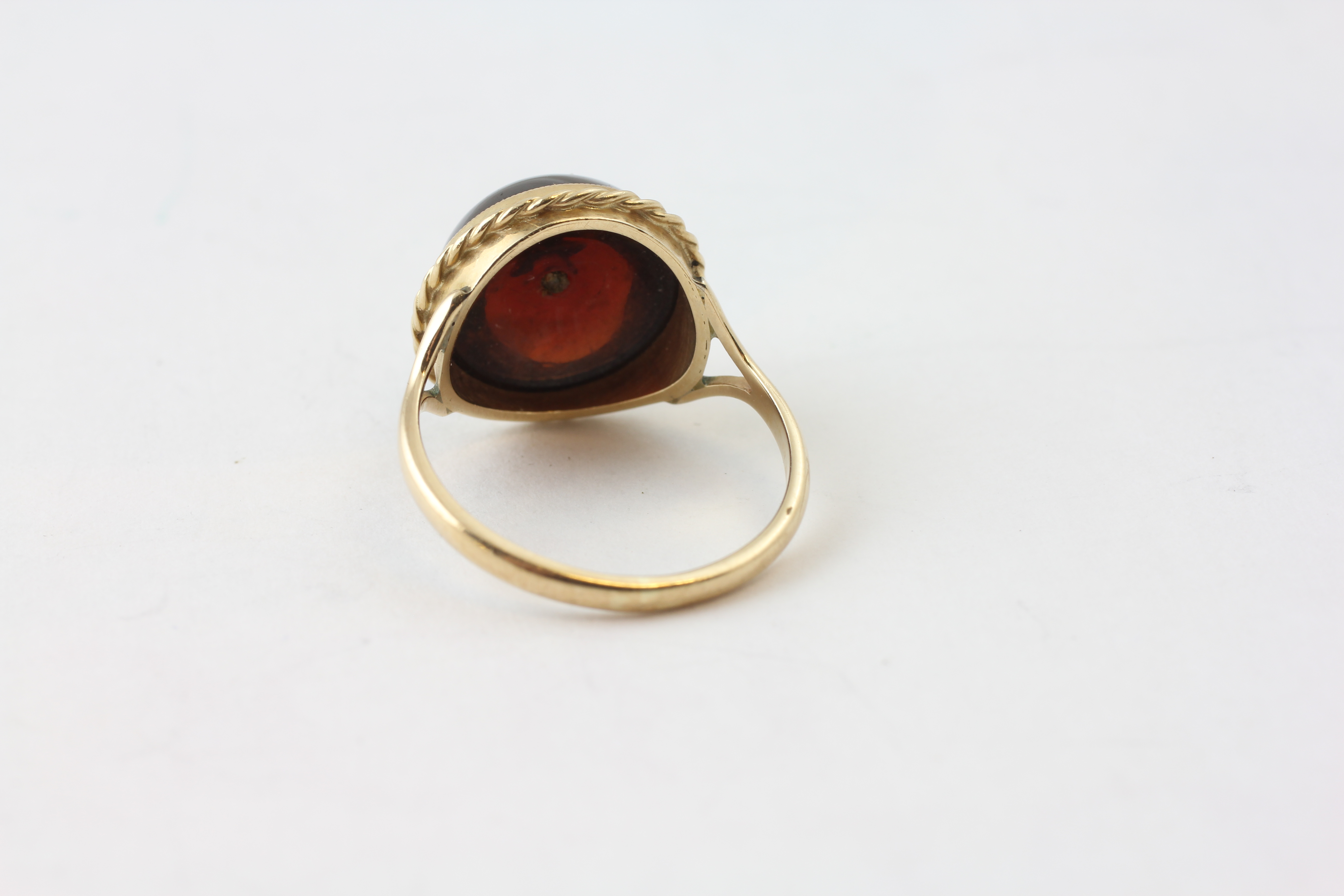 A 9CT GOLD RING SET WITH A PALE RED CABOCHON, MOUNTED WITH A DIAMOND, - Image 4 of 4