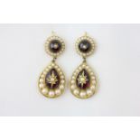 A PAIR OF DROP EARRINGS OF CABOCHON AND PEARL DESIGN, SET IN AN UNMARKED YELLOW METAL,