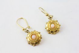 A PAIR OF PALE OPAL DROP EARRINGS SET IN 9CT GOLD,