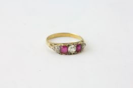 A DIAMOND AND RUBY RING,