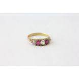 A DIAMOND AND RUBY RING,