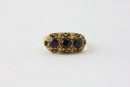 A THREE STONE GARNET, SEED PEARL AND AMETHYST RING (VERY WORN CONDITION), PROBABLY SET IN 15CT GOLD,