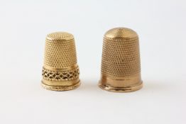 TWO GOLD THIMBLES, ONE MARKED 9CT.