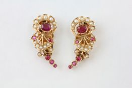 A PAIR OF RUBY AND SEED PEARL SET CLIP ON JEWELS, SET IN UNMARKED YELLOW METAL,