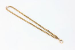 A 15CT. GOLD CHAIN, THE LINKS OF REEL DESIGN, LENGTH 36CM.