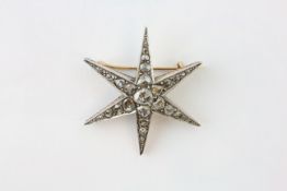 A DIAMOND BROOCH OF SIX-POINTED STAR DESIGN AND SET WITH 31 OLD CUT DIAMONDS, DIAMETER APPROX.
