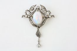 AN OPAL AND DIAMOND BROOCH, THE OVAL CABOCHON APPROX.