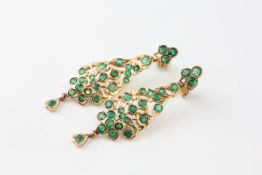 A PAIR OF EMERALD STUD DROP EARRINGS, EACH SET WITH TWENTY FIVE STONES,