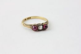 A DIAMOND AND AMETHYST RING,
