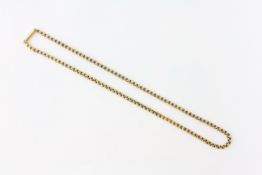 AN UNMARKED YELLOW METAL CHAIN, ASSUMED 18CT, LENGTH 43.