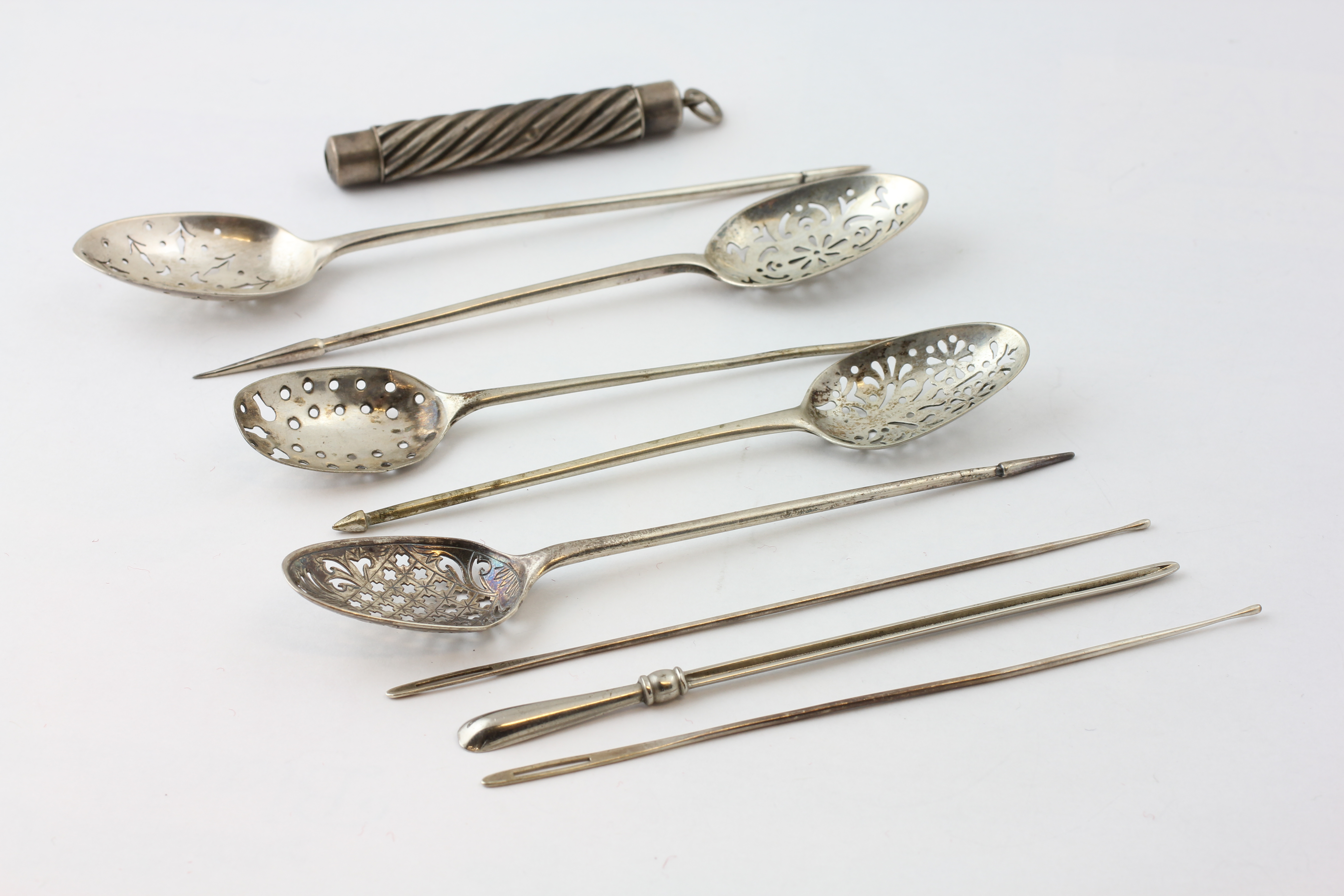 TWO SILVER MULBERRY/OLIVE SPOONS, LONDON 1799, THREE MULBERRY/OLIVE SPOONS, ONE EAR SCOOP,