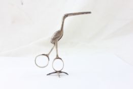 A PAIR OF GEORGE III SILVER NIPS IN THE FORM OF A STANDING STORK BY FEARN CHAWNER