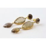 A PAIR OF EDWARDIAN DROP EARRINGS, THE PENDANT LEAVES SET WITH CARVED HARDSTONE,