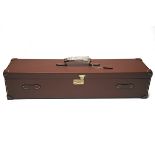 AN UNUSED TAN LEATHER DOUBLE UNIVERSAL GUNCASE, fitted for 31in. barrels, the interior lined with