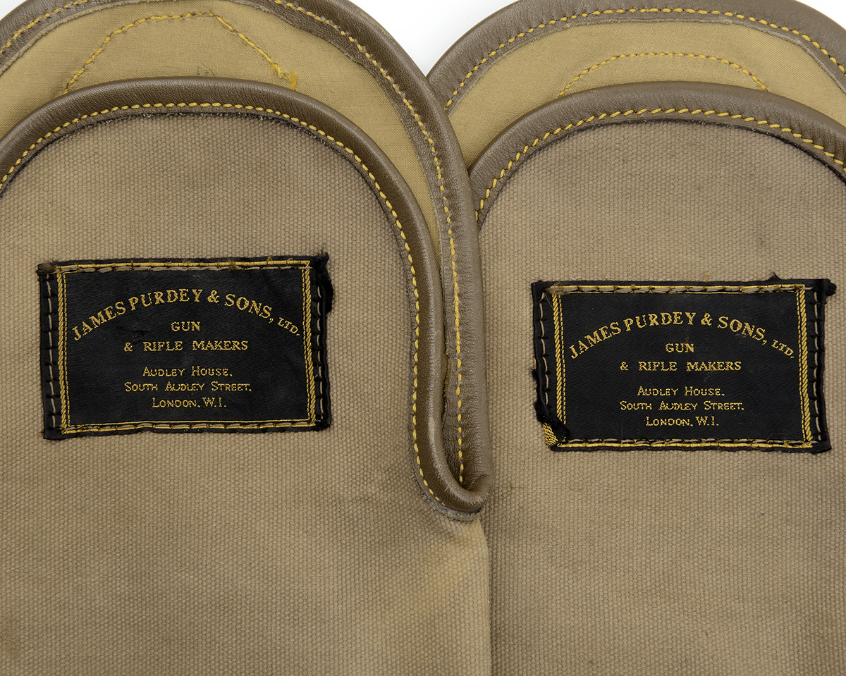 JAMES PURDEY & SONS TWO CANVAS AND LEATHER SINGLE GUNSLIPS, with leather shoulder straps and brass - Image 2 of 2