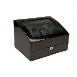 A WOOD CASED QUADRUPLE AUTOMATIC WATCH-WINDER WITH STORAGE FOR A FURTHER SIX WATCHES, unsigned,