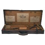 CHARLES LANCASTER A LEATHER DOUBLE GUNCASE, fitted for 29in. barrels, the interior lined with