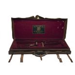 HOLLAND & HOLLAND LTD. A LEATHER DOUBLE GUNCASE, fitted for 30in. barrels, the interior lined with