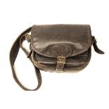 A LEATHER CARTRIDGE BAG WITH FAST-LOADING POCKETS, with canvas and leather shoulder strap and