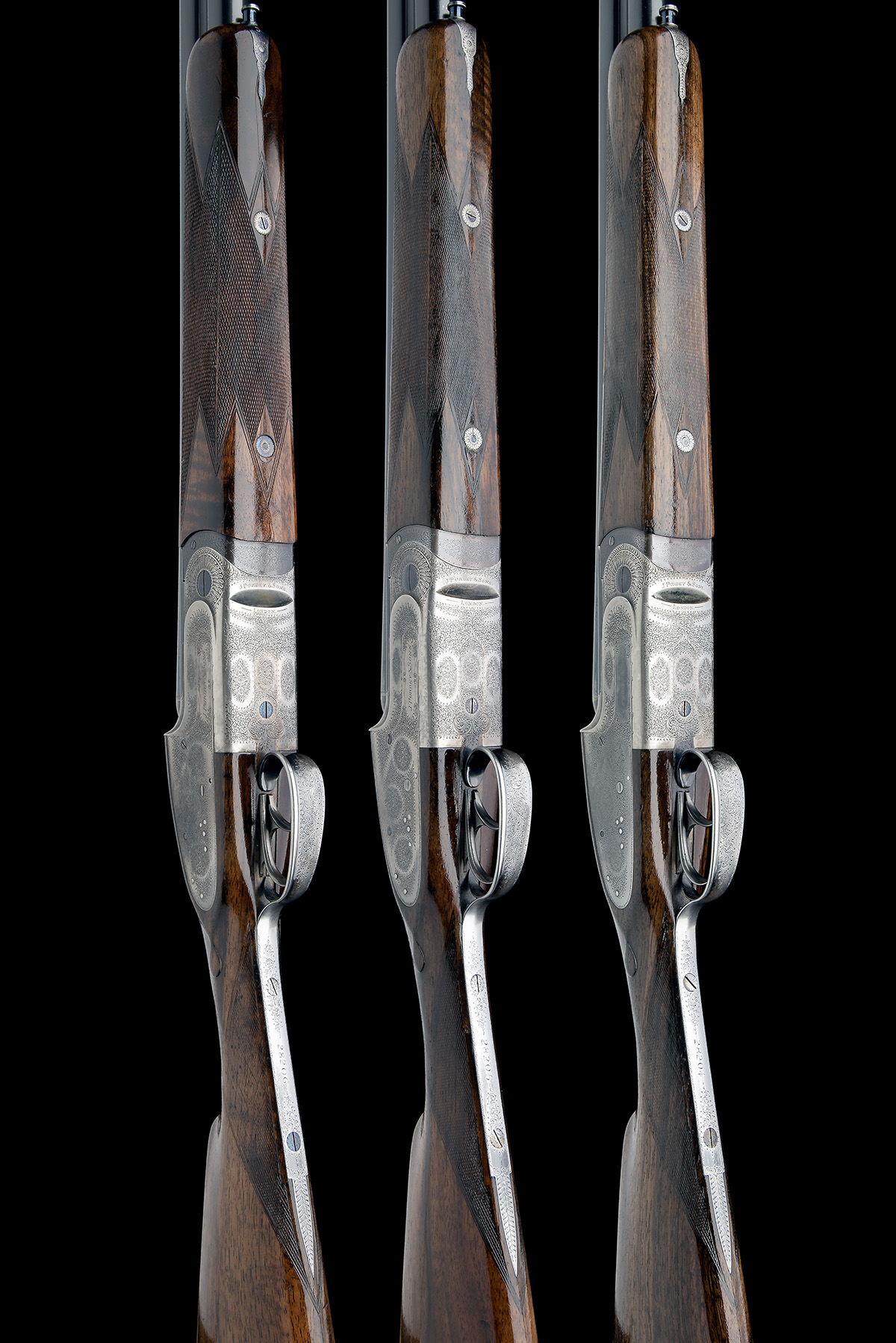 J. PURDEY & SONS A TRIO OF 12-BORE DOUBLE-TRIGGER OVER AND UNDER SIDELOCK EJECTORS, serial no. 28204 - Image 3 of 14