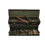 BUSSEY, LONDON A BITUMEN COATED CANVAS TWO-TIER GUNCASE FOR A PINFIRE SPORTING-GUN WITH TIN
