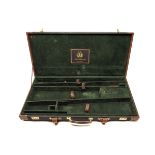 JOHN MACNAB A CANVAS AND LEATHER DOUBLE GUNCASE, fitted for 30in. barrels, the interior lined with
