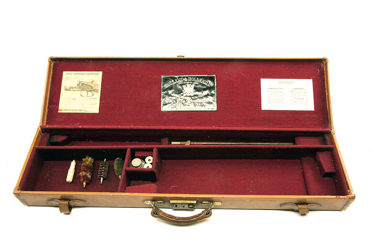 A LEATHER SINGLE GUNCASE, fitted for 30in. barrels, the interior lined with red baize, a Holland &