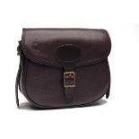 GILES MARRIOTT A LEATHER CANVAS-LINED CARTRIDGE BAG, with a canvas and leather shoulder trap with